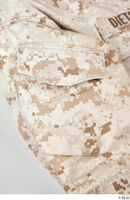  Photos Army Man in Camouflage uniform 13 21th century Army Desert uniform jacket upper body 0012.jpg